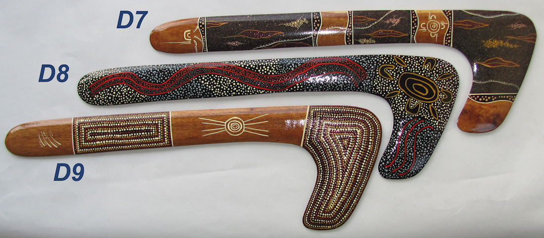 Hook boomerangs decorated by Aboriginal artists